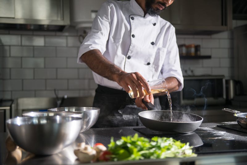 Pizzana head chef preparing dishes in the kitchen